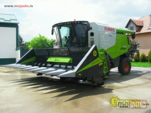 NOVI: Traktor CLAAS Heder za suncokret