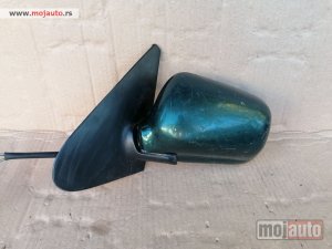 polovni delovi  305. Levi retrovizor, manuelni Volkswagen Polo 1994-1999.g.