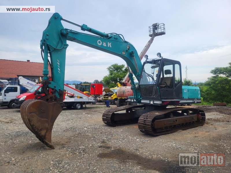 Glavna slika - NEW HOLLAND O&K RH4 PLUS - MojAuto
