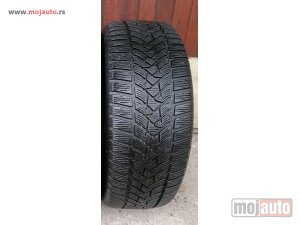 polovni delovi  2279. Guma DUNLOP 16-ica, ZIMSKA 215/55, Šara 6,1 mm, DOT 4116