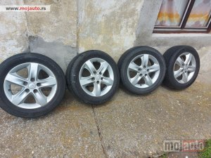 Glavna slika - GUME SA ALUMINIJSKIM FELNAMA ZA KIU - MojAuto