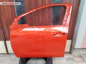polovni delovi  Prednja leva vrata, narandzasta za Peugeot 208 od 2012. do 2020. god.