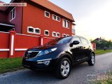 polovni Automobil Kia Sportage Black and Orange 