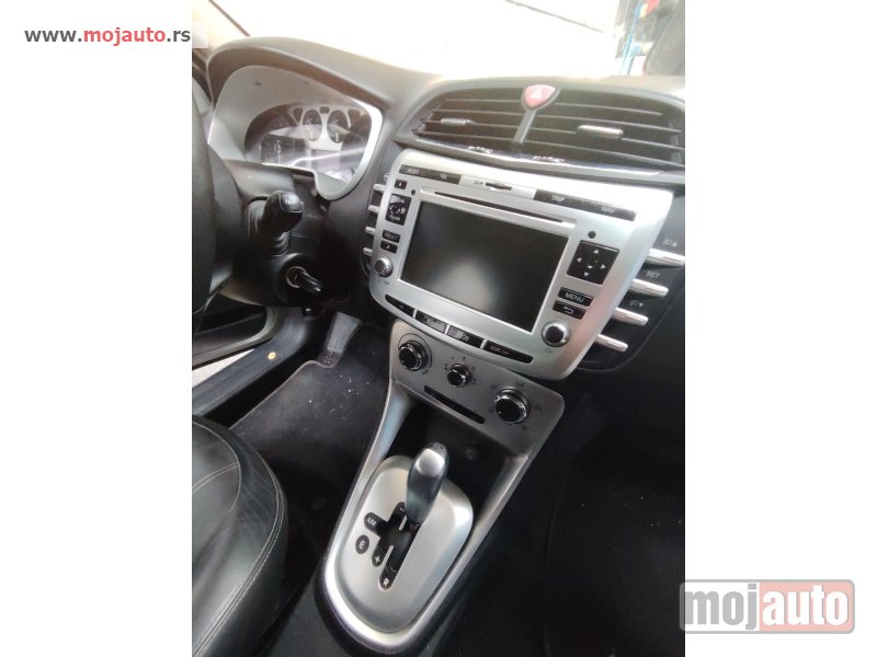 Glavna slika -  Lancia delta ručica menjača automackog selespeed  Originalni delovi  Moguca ugradnja delova  Alfa Romeo 147-156-166-159-GT-MiTo-Giulietta Fiat bravo 2 - croma -grande punto -multipla 2 -punto 3 -stilo-idea Freemont Panda 3 500L Lancia ypsilon-delta-m - MojAuto