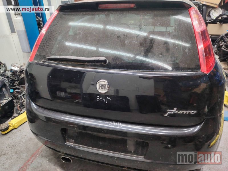 Glavna slika -  Fiat Grande Punto gepek kod boje 891/b Originalni delovi  Moguca ugradnja delova  Alfa Romeo 147-156-166-159-GT-MiTo-Giulietta Fiat bravo 2 - croma -grande punto -multipla 2 -punto 3 -stilo-idea Freemont Panda 3 500L 500 Lancia ypsilon-delta-musa-lybra  U - MojAuto