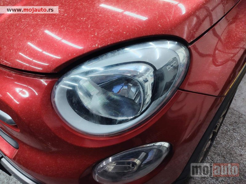 Glavna slika -  Fiat 500x Cross levi far Originalni delovi  Moguca ugradnja delova  Alfa Romeo 147-156-166-159-GT-MiTo-Giulietta Fiat bravo 2 - croma -grande punto -multipla 2 -punto 3 -stilo-idea Freemont Panda 3 500L 500 Lancia ypsilon-delta-musa-lybra Volkswagen Golf - MojAuto