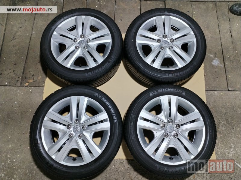 Glavna slika -  Felne 16-ice sa ratkapnama za Peugeot 208, 4X108 sa MICHELIN gumama - MojAuto