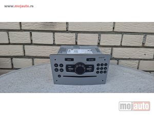 Glavna slika -  FABRICKI CD MP3 SA KODOM OPEL CORSA D 2006 - 2014 - MojAuto