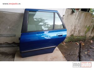 polovni delovi  Zadnja leva vrata KMWC za Peugeot 406 od 1999. do 2005. god.