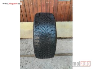 polovni delovi  3728. Guma BRIDGESTONE 18-ica, ZIMSKA 225/45, Šara 5.3 mm, DOT 4721