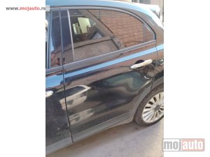 Glavna slika -  Fiat 500x zadnja leva vrata kod boje 601 Originalni delovi  Moguca ugradnja delova  Alfa Romeo 147-156-166-159-GT-MiTo-Giulietta Fiat bravo 2 - croma -grande punto -multipla 2 -punto 3 -stilo-idea Freemont Panda 3 500L 500 500x Lancia ypsilon-delta-musa-l - MojAuto