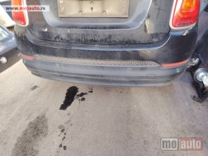 Glavna slika -  Fiat 500x zadnji branik kod boje 601 Originalni delovi  Moguca ugradnja delova  Alfa Romeo 147-156-166-159-GT-MiTo-Giulietta Fiat bravo 2 - croma -grande punto -multipla 2 -punto 3 -stilo-idea Freemont Panda 3 500L 500 500x Lancia ypsilon-delta-musa-lybra - MojAuto
